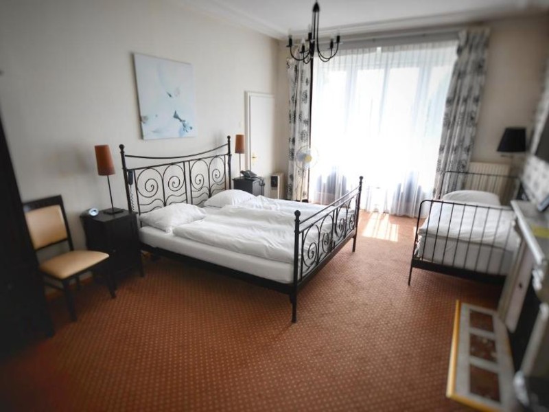 Quarto antigo do Hotel Splendid com camas de casal de solteiro