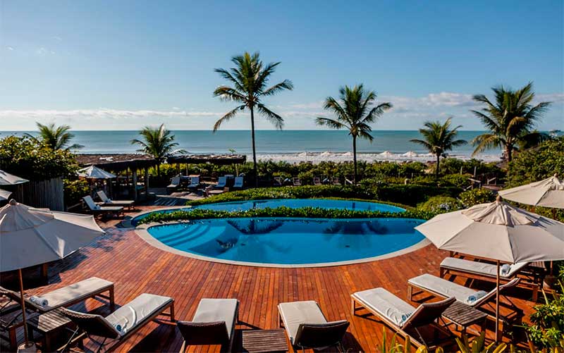 Pousadas em Trancoso: Área externa da Estrela d'Água com piscina e vista para o mar (Foto: Divulgação)