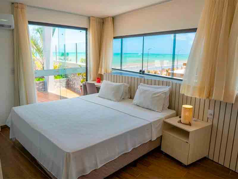 Quarto do Bessa Golden Flats, dica de onde ficar em João Pessoa, com cama de casal e vista pra praia