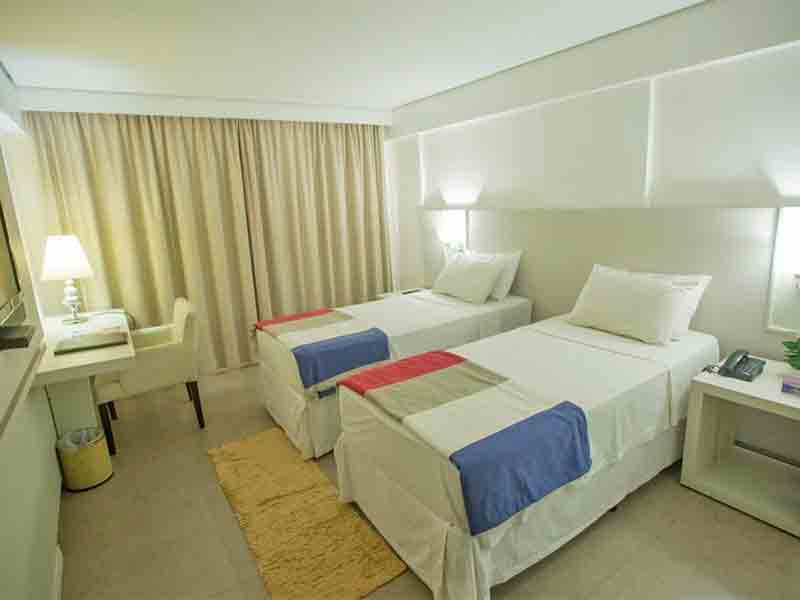 Quarto do Cabo Branco Atlântico Hotel, dica de hotel em João Pessoa, com duas camas de solteiro