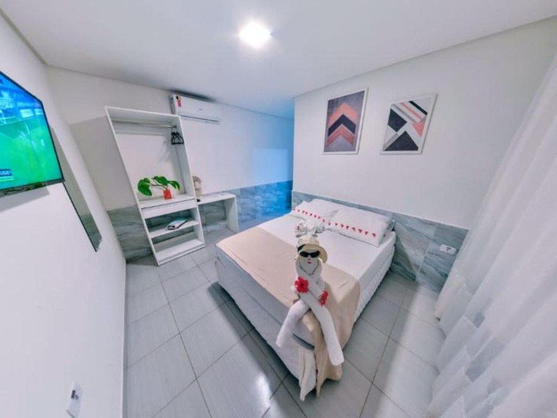 Quarto da Joia Rara, dica de onde ficar em Maracaípe, com cama de casal, TV e ar-condicionado